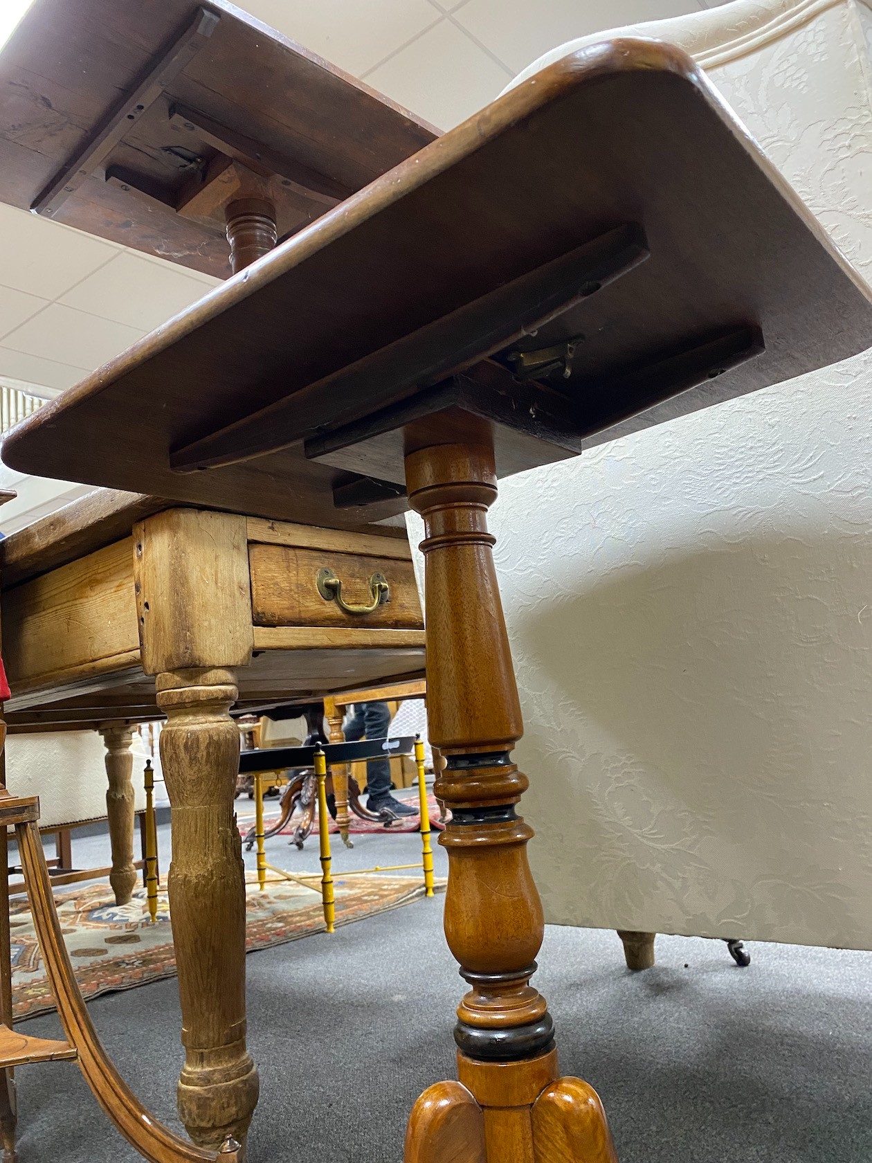 A Regency mahogany rectangular tripod tea table, width 59cm, depth 43cm, height 71cm